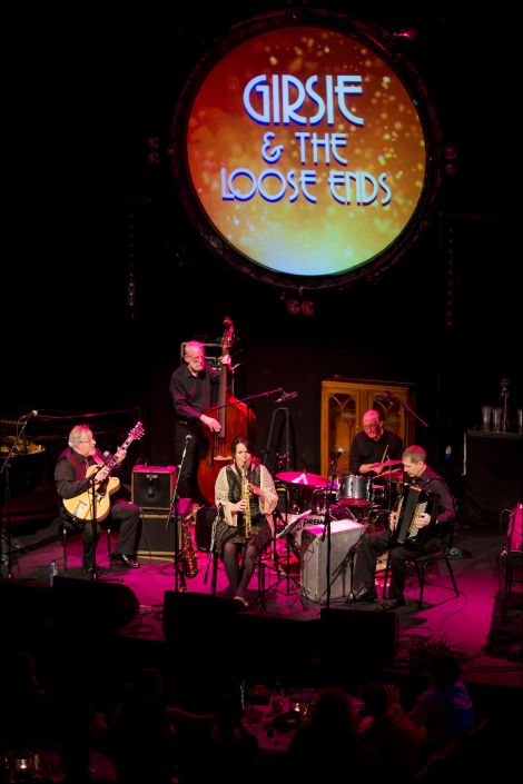 Girsie and the Loose Ends. There was extra applause for sax player Helen Tait, who had bravely turned out prior to heading to hospital to get her injured leg treated. Photo: Dale Smith.