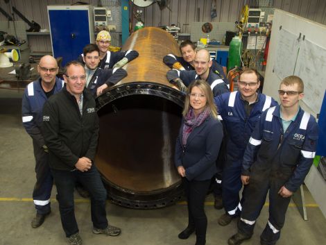 John Henderson, MD of Ocean Kinetics Limited (left) and Katrina Wiseman HIE (right) seen here with staff at Ocean Kinetics - Photo: Ben Mullay.HIE