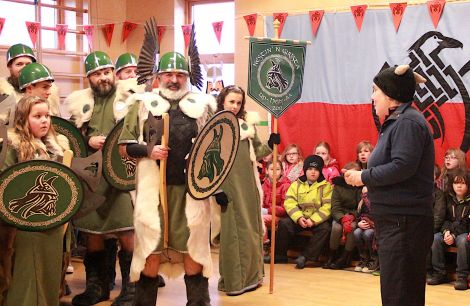 Welcoming the jarl's squad to Nesting primary school headteacher Kate Coutts reveals that this is also her 25th Up Helly Aa anniversary since working as a teacher - all other photos: Hans J Marter/Shetland News