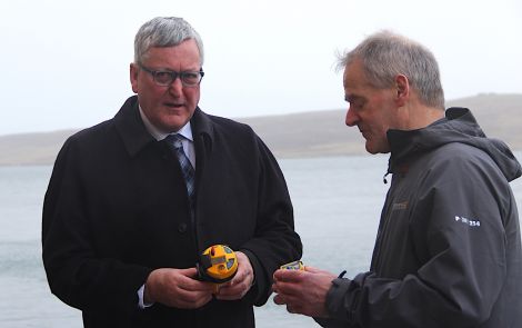 Scottish fishing minister Fergus Ewing with Shetland Fishermen's Assocation's Leslie Tait. Photo: Hans J. Marter/Shetland News