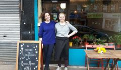 Gabby Cluness, who grew up on Shetland's West Side, outside Milk Cafe which she runs with business partner Angela Ireland (right).