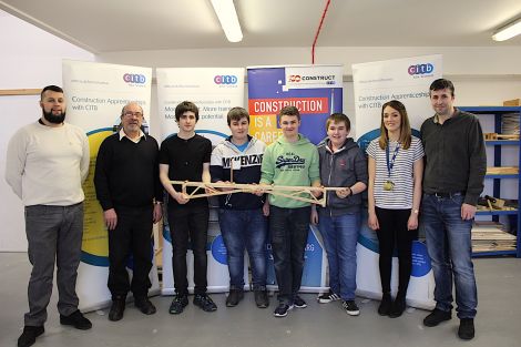 Shetland apprenticeship ambassador Ryan Jamieson, SCTG chairman Robert Anderson (left), apprenticeship officer Carrie Ann MacDonald and Shetland College senior lecturer in constructing Anthony McLeod (right) with the winning team from Brae High School consisting of Jake Rendall, Jack Garrick, Sam Nicolson and James Johnson in the centre - Photo: Hans J Marter/ Shetland News