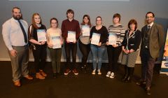 Youth volunteering development worker Neil Pearson (left), Voluntary Action Shetland executive officer Catherine Hughson (second from right) and Shetland Times editor Adam Civico (right) with the recipients of the summit awards (left to right): Imogen Teale, Rachel Keay, Thomas Hawick, Holly Cole, Mariel Leask, and Catriona Gilbertson - Photo:Dave Donaldson