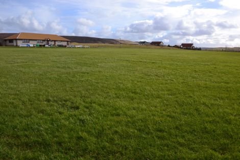 The pitch at Strom. Ross Smith of Injury Shetland has started a fundraising campaign to pay for a defibrillator. Photo: Shetland News.