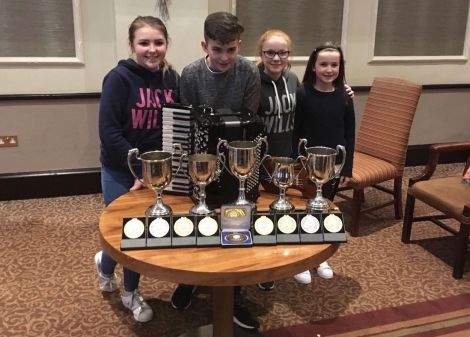 Shetland's young prize winners with their impressive trophy haul.