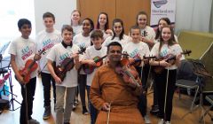 Tutor Balu Raguraman with his class of fiddle students from London and Shetland.