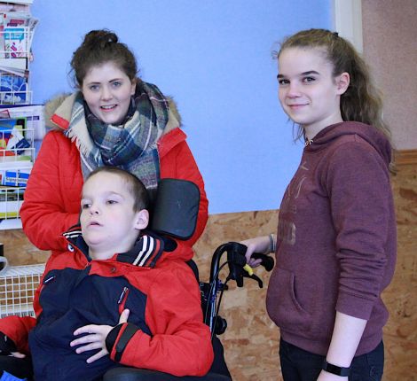 Volunteers Katie Leask (left) and Megan Brennan with Ryan Brennan - Photo: Hans J Marter/ Shetland News