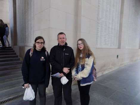 AHS S3 pupils Holly Mouat and Carys Nield pictured with history teacher John Sandison at Menin Gate, Ypres during last month's trip.