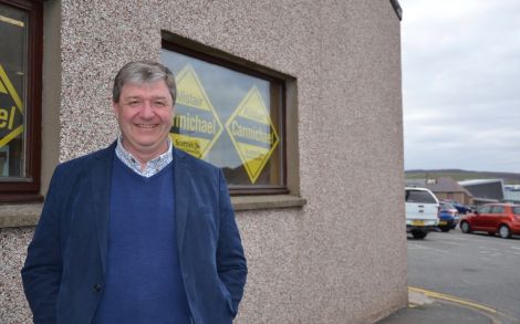 Alistair Carmichael outside his campaign office across from the Great Wall restaurant on Monday afternoon. Photo: Shetland News/Neil Riddell.
