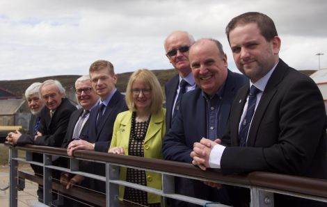 The newly elected SIC leadership (from left to right): Shetland College board chairman, Peter Campbell; audit committee chair and vice chair of the IJB, Allison Duncan; chair of planning, vice-chair of education and vice-chair of Shetland College, Theo Smith; council convener Malcolm Bell, depth convener Beatrice Wishart; political leader Cecil Smith; chair of the education and families committee George Smith and chairman of the environment and transport committee Ryan Thomson. Missing from the photo are depute leader Steven Coutts who couldn't attend the meeting, and chair of the harbour board Andrea Manson. Photo: Hans J Marter/ Shetland News