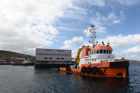 The tug Mustang pulling the accommodation barge off its berth at Morrison Dock on Wednesday afternoon. Photo: Malcolm Younger/Millgaet Media