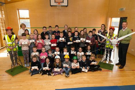 Pupils from the Nesting and Sandness primary schools are being joined by Shawney Henderson of Edinburgh Science Festival (front row left), Jenny Wink of Shetland Gas Plant (back row left), Lizzie Leask of Total E&P UK (back row right), Sophie McCabe of Edinburgh Science Festival (front row right), and Shetland MSP Tavish Scott.