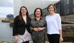 Wordplay curator Karen Cunningham (centre) pictured with Cara McDiarmid (left) and Floortje Robertson (right) of Shetland Arts. Photo: Jenny Leask.