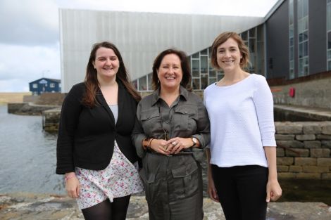 Wordplay curator Karen Cunningham (centre) pictured with Cara McDiarmid (left) and Floortje Robertson (right) of Shetland Arts. Photo: Jenny Leask.