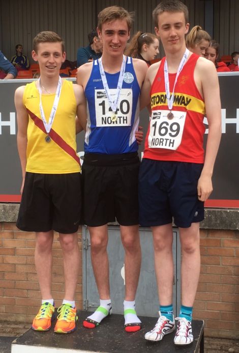 Seamus Mackay, centre, set a new Shetland senior record in winning the 800 metres.