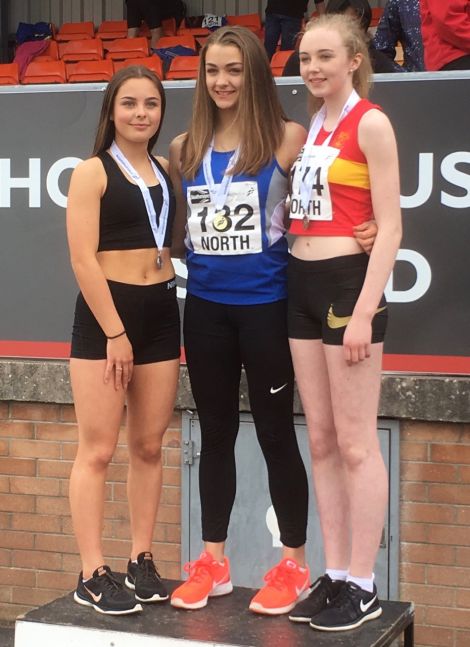 Runner Katie Dinwoodie, centre, won three gold medals.