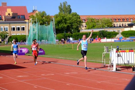 Seumas Mackay celebrates crossing the line to win gold in the men's 800 metres in Gotland on Tuesday. Photo: Shetland Island Games Association.