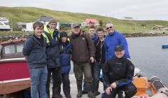 The team that successfully herded the pilot whale out of Vidlin Voe (left to right): James Johnson, Pete and Jan Bevington of Hillswick Wildlife Sanctuary, Hugh Harrop of Shetland Wildlife, Paul Hunter, Sam Nicolson, Ian White and Ryan Leith - Photo: Tim Stenton/Shetland Wildlife