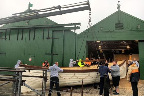 Members of Shetland's weight training club helped move the restored Oceanic lifeboat - Photos: Shetland Amenity Trust