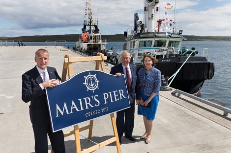 Mair's Pier was officially opened by Shetland MSP Tavish Scott (left), pictured with soon-to-retire LPA chairman Brian Anderson and the authority's chief executive Sandra Laurenson. Photo: John Coutts.