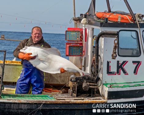 Gary Bremner with his unexpected catch. Photo: Garry Sandison.