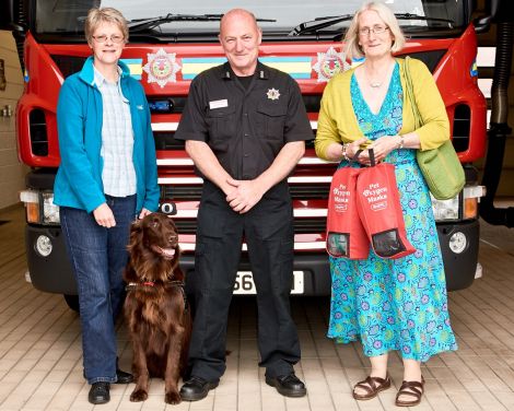 Pheona Horne, Loki the dog, Lerwick station manager Graham Reid and Tricia Brown. Photo: Chris Brown.