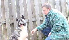 Craig Fullerton with his Japanese akita dog Tahni.