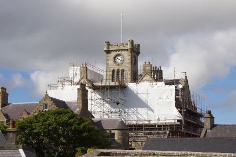 With work progressing on the stonework at Lerwick Town Hall, the refurbished clock tower is now visible again. Photo: Shetland News/Hans J. Marter.