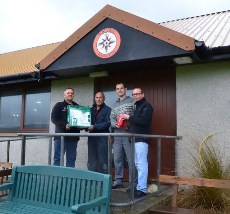 From left to right: Victor Wilson of Total, Ivan Sinclair of the Strom Park Development Trust, Ross Smith of Injury Shetland and Neil Bruce of Costain. Photo: Shetland News.