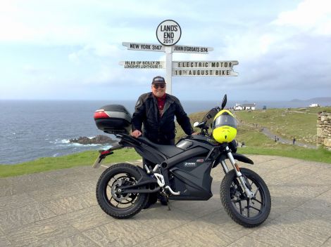 John Chivers at the Land's End sign at the start of his trip.