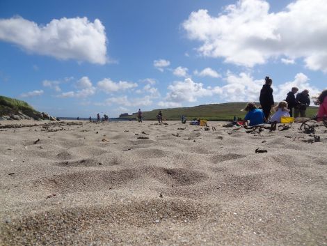 Kids making most of the sunshine at Norwick Beach during UnstFest. 