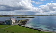 Burrastow House enjoys fine views over the sea on Shetland's westside.