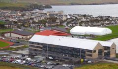 The new Anderson High School seen from Staney Hill with the Clickimin Leisure Centre in the background. Photo: Shetland News