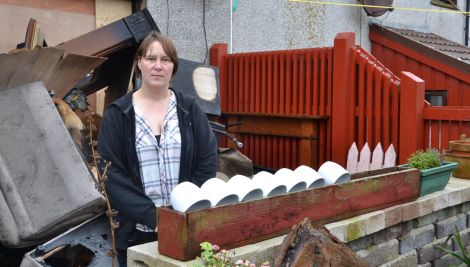 Helen Tait outside her Sandveien home, which was ravaged by fire at the weekend. Photo: Shetland News/Neil Riddell.