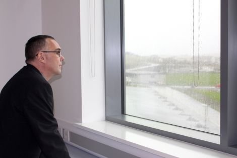 Lerwick North councillor John Fraser looking out onto the Clickimin running track from an art and design room.