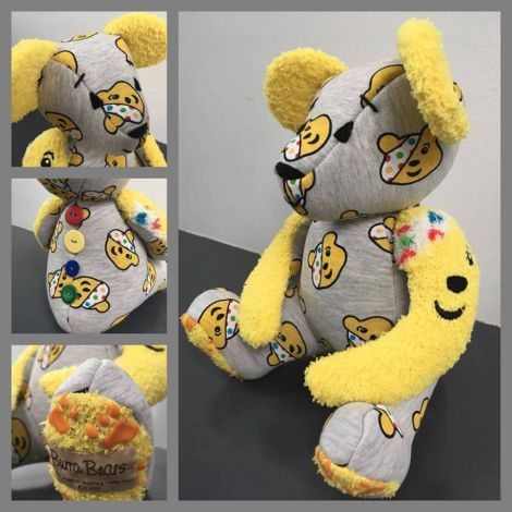 Up for auction are 100 items from a Burra Bear in the Children in Need colours...