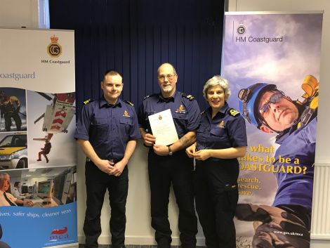 Dave Sweeney and Alex Dodge presenting Bob Hudson (centre) with his award on Sunday.