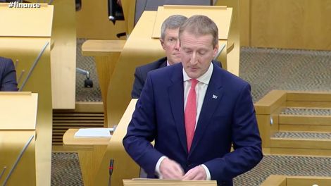 Tavish Scott speaking during the fair ferry funding debate at Holyrood on Wednesday. Photo courtesy of Scottish Parliament.