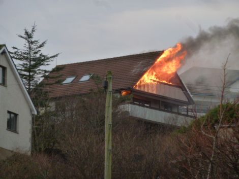 The fire took hold on the first floor and roof area of the property. Photo: Gordon Stark.