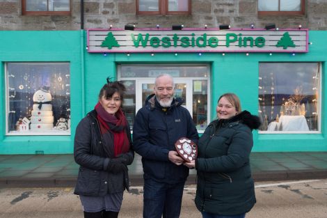 Left to right: Marina Hunter and Marie Gaffney (Westside Pine) with Living Lerwick director Dave Williams. Photo: Ben Mullay