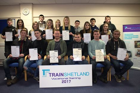 Apprentices present at the ceremony pose for a photo. They are: Back row (left to right): Cameron Leslie, Natasha Chapman, Magnus Irvine, Logan Grant, Magnus Fullerton, Middle row (left to right): Cameron Gibbs, Clare Farmer, Nicole Craigie, Josephine Nisbet, Emma Leask, Kirsten Isbister, Rhona Tait, Front row (left to right): Jakob Eunson, Kurt Crow, Joe Keith, Michael Anderson, Kieran Wilbourne, and Daniel Hughson.