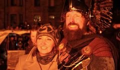 Jarl Stewart Jamieson and his wife Elaine watching the galley going up in flames.