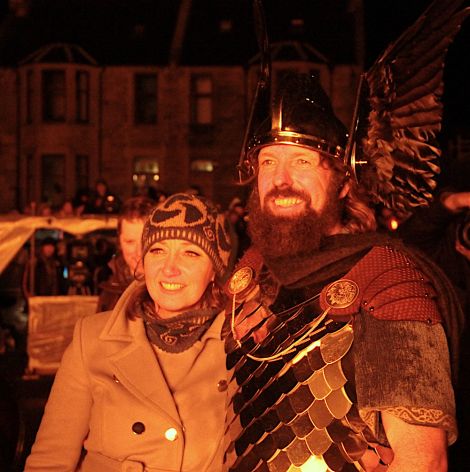 Jarl Stewart Jamieson and his wife Elaine watching the galley going up in flames.