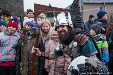 Guizer jarl Stewart Jamieson posing with the pupils from Bells Brae primary school.