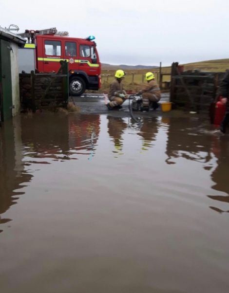 A fire engine was called out to pump water from the workshop and yard.