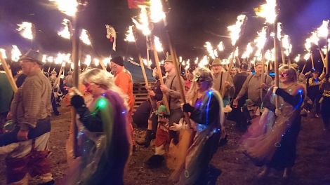 Guizers circling the galley prior to the burning on Friday night. Photo: Kevin Osborn