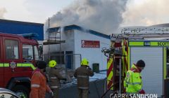 Two appliances from Lerwick responding to the fire in the takeaway. Photo: Garry Sandison