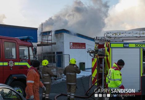 Two appliances from Lerwick responding to the fire in the takeaway. Photo: Garry Sandison