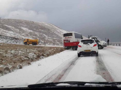 Beverley Lamming took this photo of a school bus after its rear end came off the road while coming out of Scalloway.