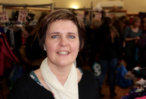 Sharon Deyell at her Swapshop on Sunday as people from across Shetland rummage for clothes. Photo: Chris Cope/Shetland News